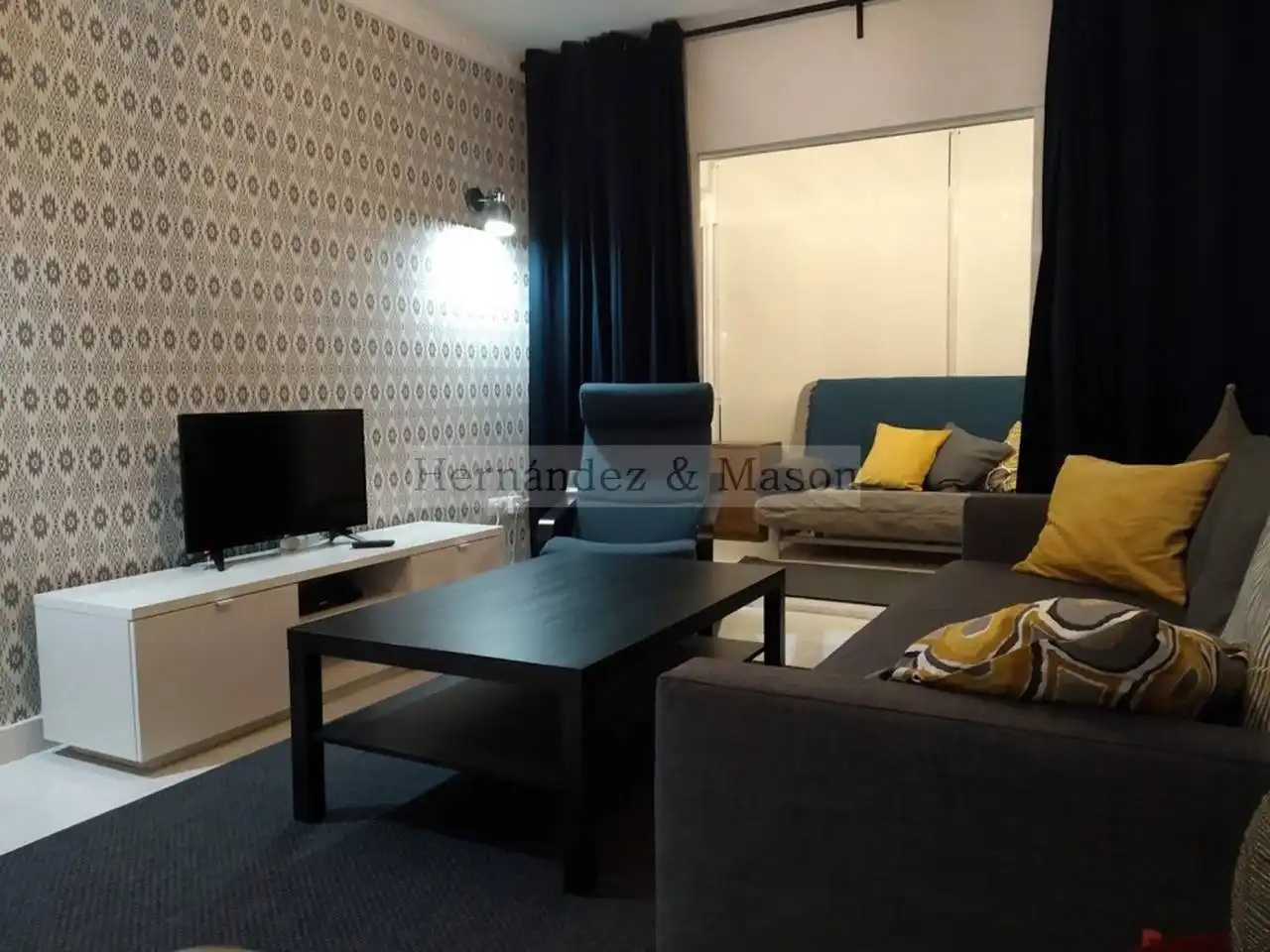 Sala d'estar de Apartament en venda en Benalmádena amb Aire condicionat, Terrassa i Moblat