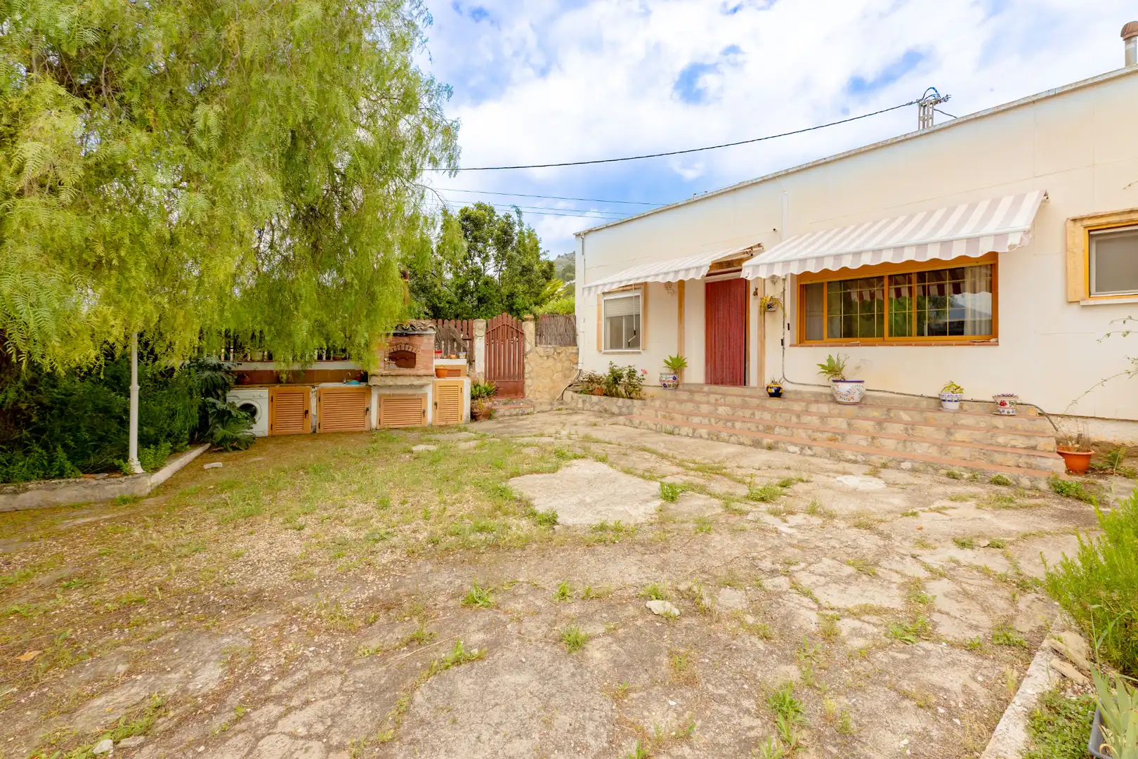 Außenansicht von Einfamilien-Reihenhaus zum Verkauf in Alcalalí mit Klimaanlage