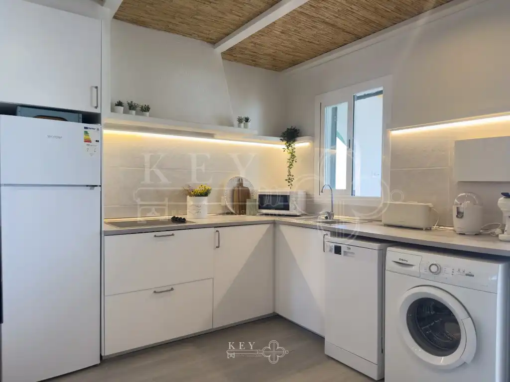 Cuina de Apartament en venda en Ciutadella de Menorca amb Aire condicionat, Jardí privat i Piscina