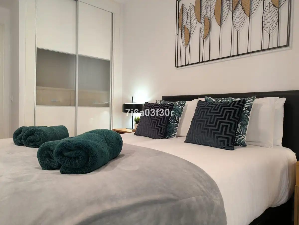 Schlafzimmer von Wohnungen zum Verkauf in Marbella mit Heizung, Privatgarten und Terrasse