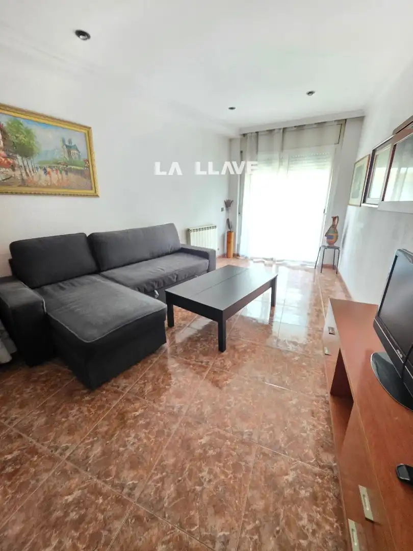 Sala de estar de Piso en venta en Blanes con Calefacción, Terraza y Amueblado