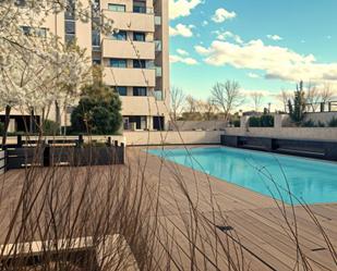 Swimming pool of Attic for sale in  Madrid Capital  with Air Conditioner, Heating and Private garden