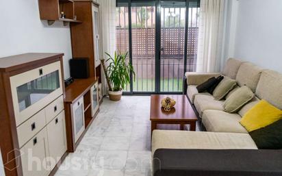 Living room of Planta baja for sale in Mairena del Aljarafe  with Air Conditioner, Private garden and Terrace