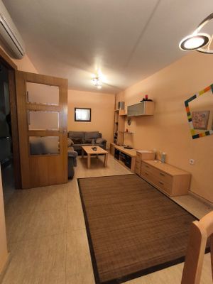 Sala d'estar de Casa adosada en venda en Torre-Pacheco amb Aire condicionat, Jardí privat i Terrassa