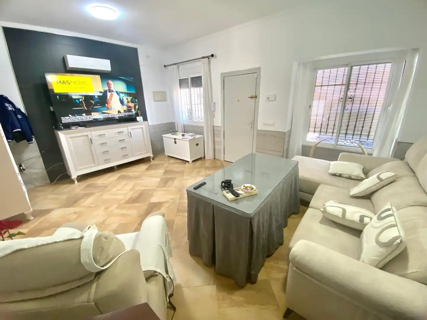 Sala de estar de Casa adosada en venta en Chipiona con Aire acondicionado, Jardín privado y Terraza