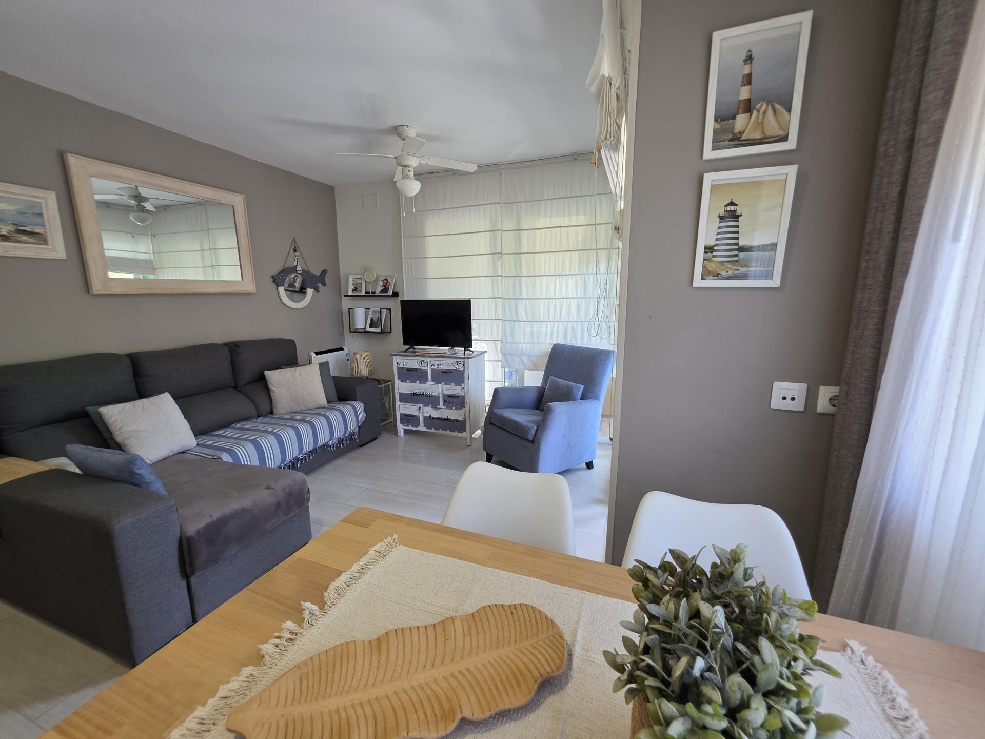 Sala d'estar de Apartament en venda en Castell d'Aro, Platja d'Aro i s'Agaró amb Jardí privat