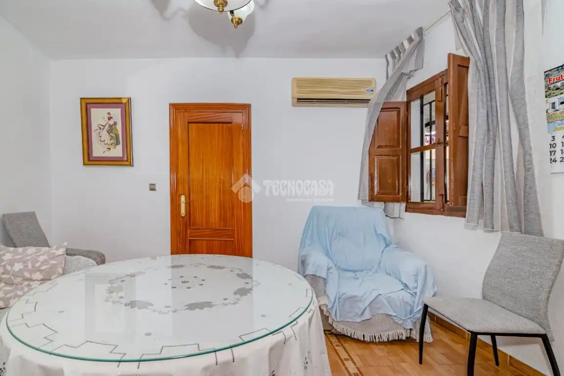 Sala d'estar de Casa adosada en venda en Loja amb Aire condicionat, Terrassa i Traster