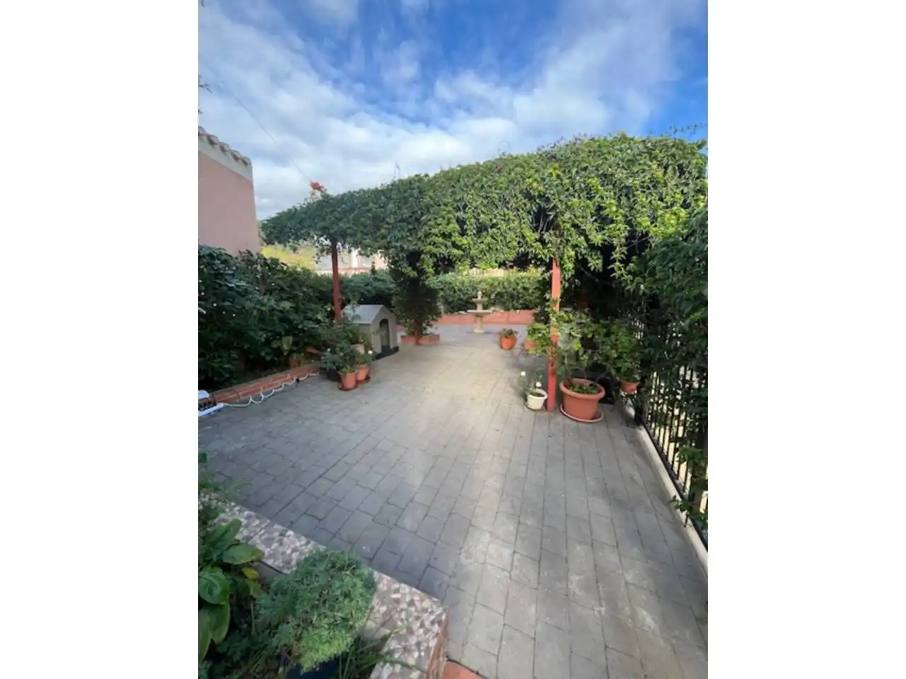 Garten von Einfamilien-Reihenhaus zum Verkauf in Estepona mit Klimaanlage, Privatgarten und Parkett