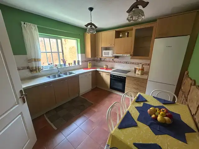 Cuina de Casa adosada en venda en Arucas amb Jardí privat, Terrassa i Traster