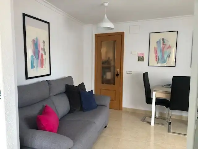 Sala d'estar de Apartament en venda en Calpe / Calp amb Aire condicionat, Calefacció i Terrassa