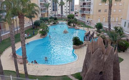 Piscina de Pis en venda en La Manga del Mar Menor amb Terrassa, Moblat i Forn