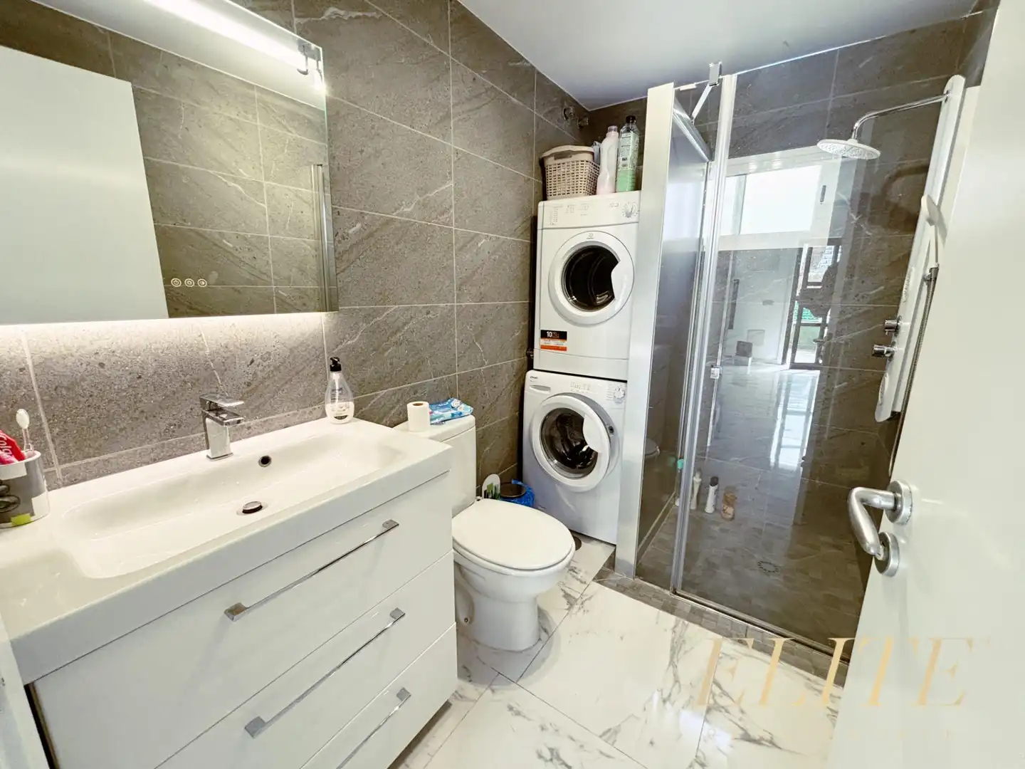 Bany de Apartament en venda en Mogán amb Aire condicionat, Jardí privat i Terrassa