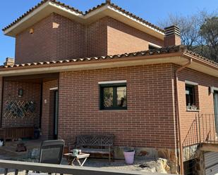 Vista exterior de Casa o xalet en venda en Llambilles amb Aire condicionat, Jardí privat i Terrassa