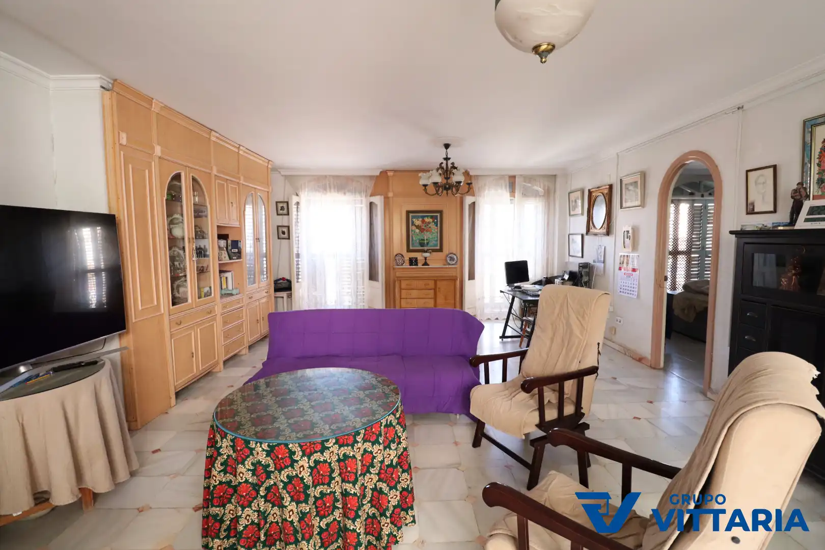 Sala de estar de Casa adosada en venta en Almería con Aire acondicionado, Terraza y Trastero