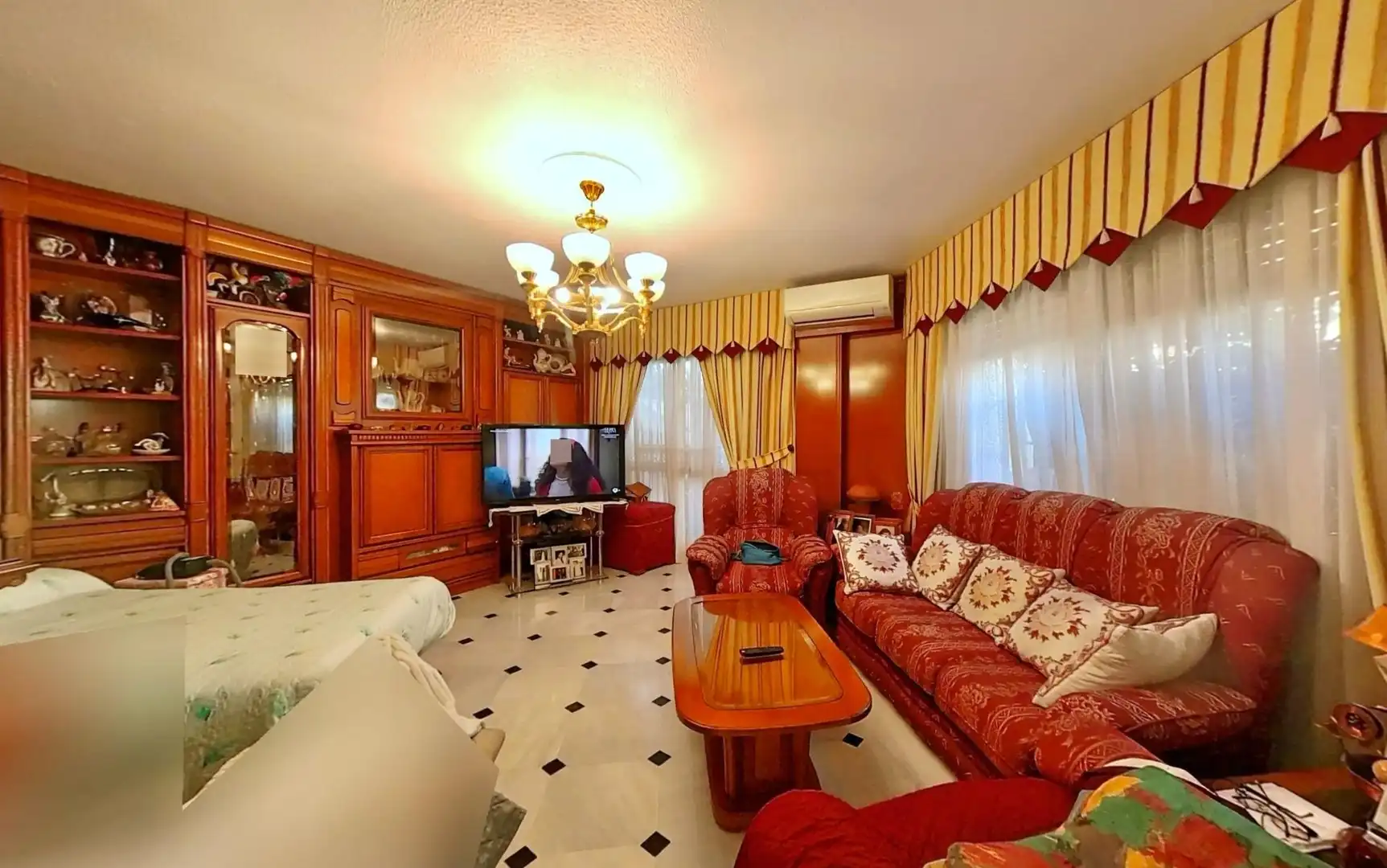 Sala d'estar de Casa adosada en venda en Málaga amb Aire condicionat, Terrassa i Piscina comunitària