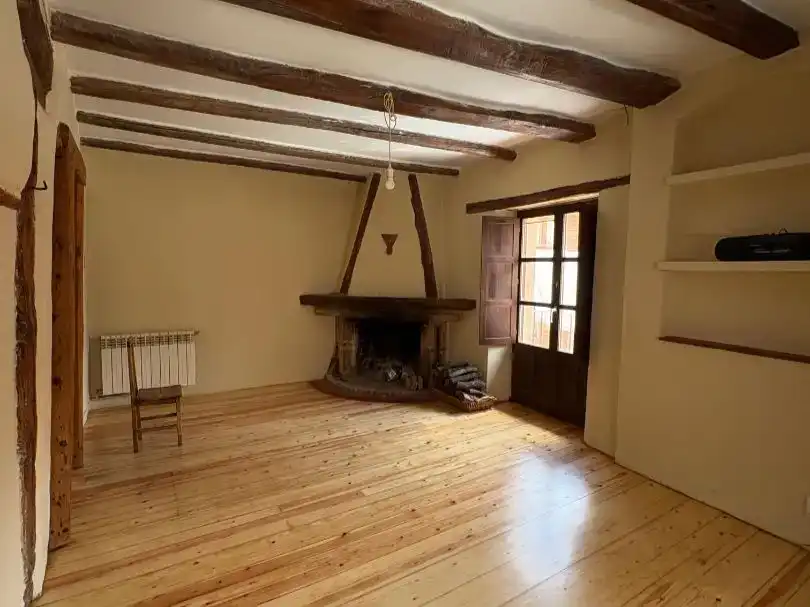 Sala d'estar de Casa adosada en venda en Simancas amb Balcó