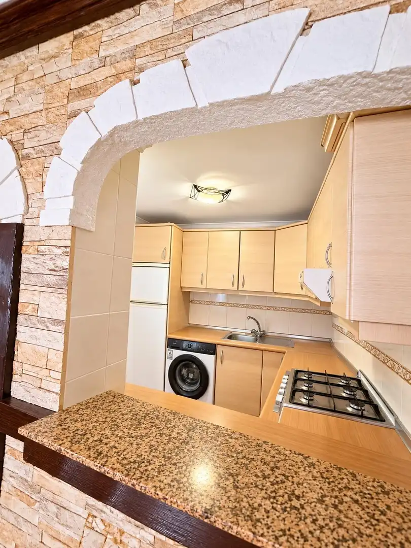 Cuina de Apartament en venda en Mazarrón amb Jardí privat, Traster i Piscina comunitària