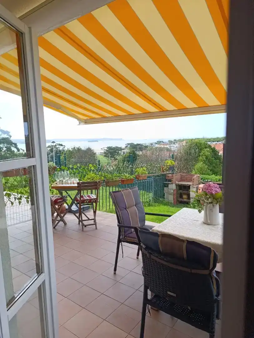 Terrassa de Casa o xalet en venda en Ribamontán al Mar amb Jardí privat, Parquet i Moblat