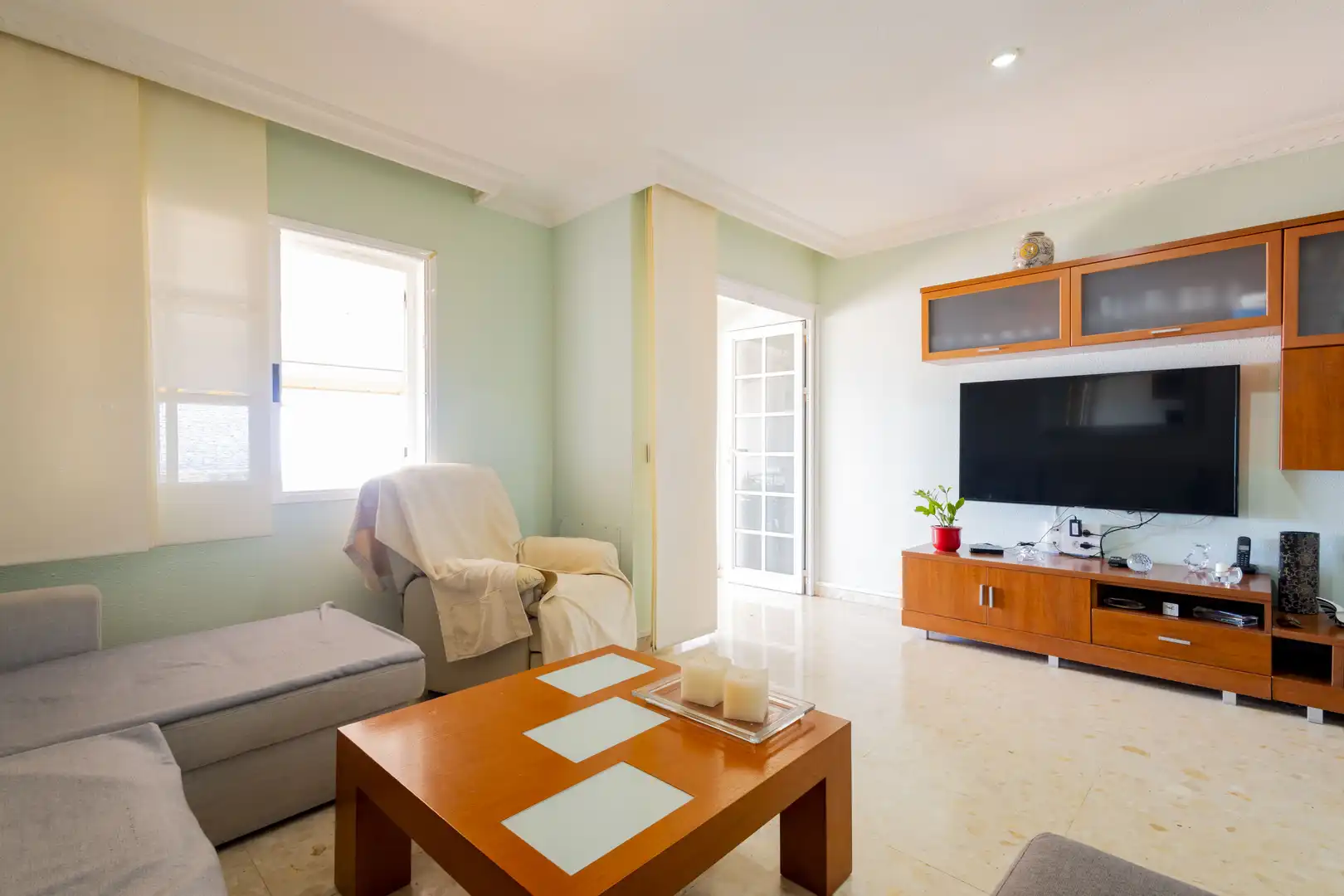 Sala de estar de Casa adosada en venta en El Rosario con Aire acondicionado, Jardín privado y Terraza