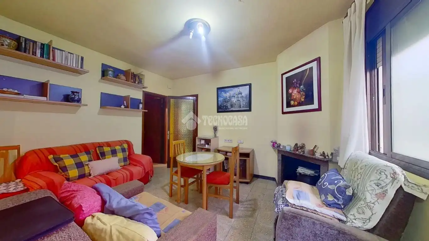 Sala d'estar de Casa adosada en venda en Granollers amb Terrassa