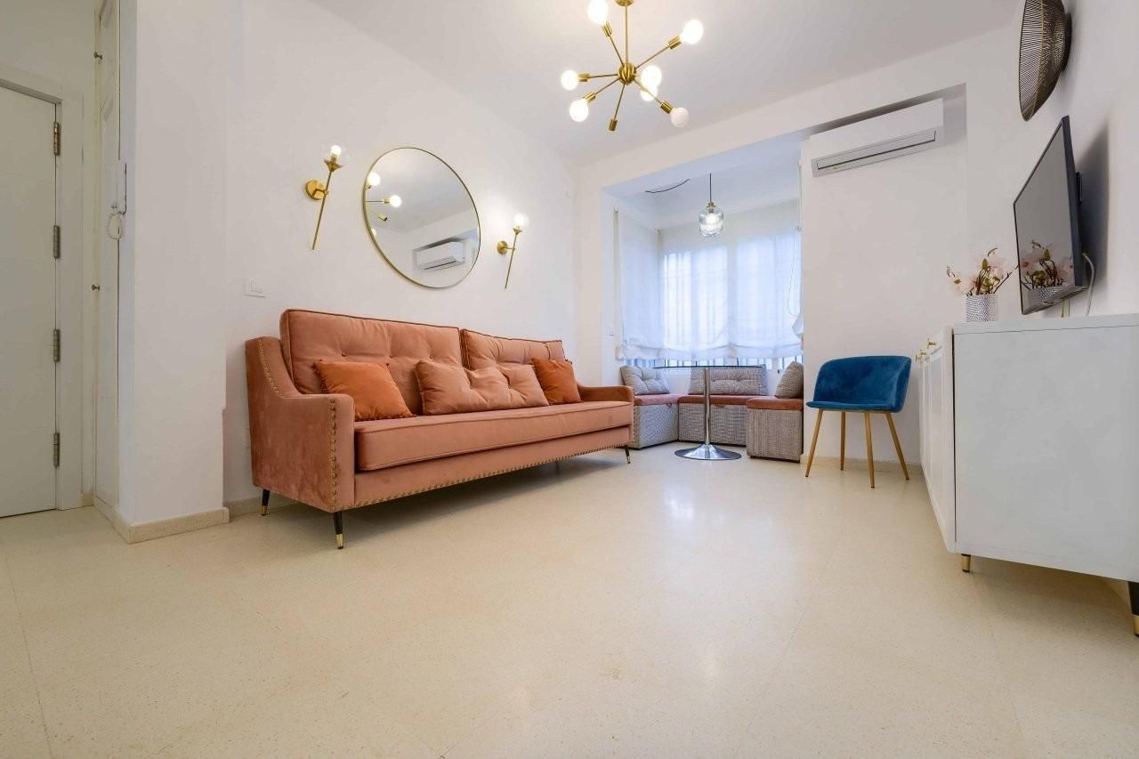 Sala de estar de Piso en venta en  Sevilla Capital con Aire acondicionado y Calefacción
