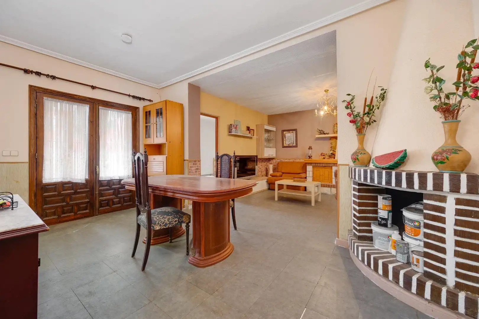 Sala d'estar de Casa adosada en venda en Orihuela amb Aire condicionat, Jardí privat i Terrassa