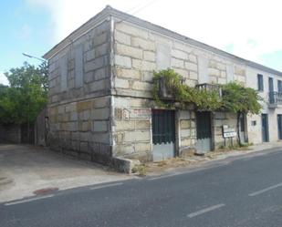 Vista exterior de Casa adosada en venda en A Merca   amb Calefacció, Jardí privat i Traster