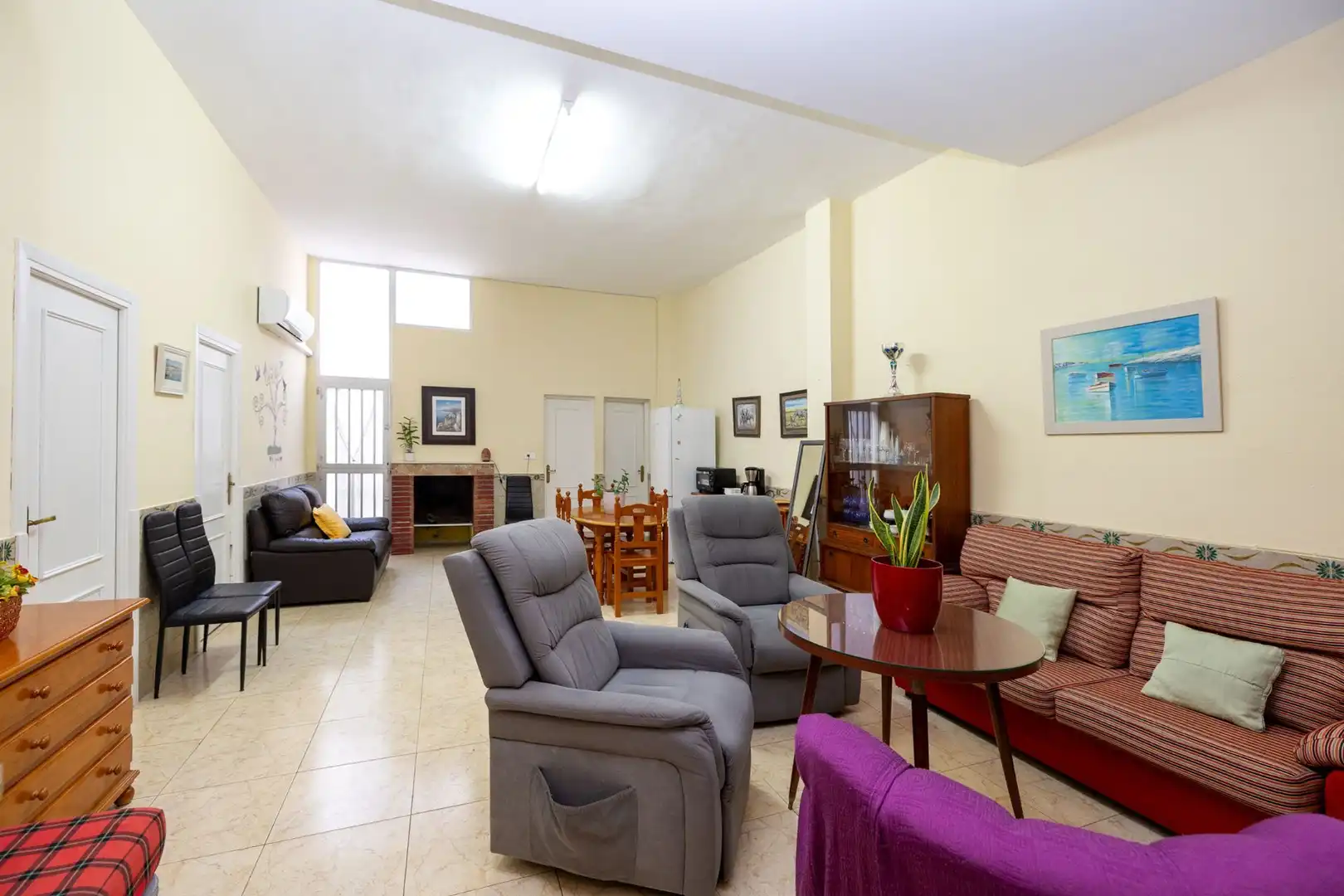 Sala de estar de Casa adosada en venta en Motril con Aire acondicionado, Calefacción y Terraza