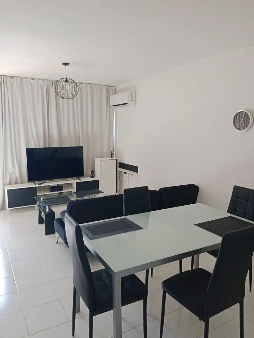 Sala d'estar de Apartament en venda en Benidorm amb Aire condicionat, Jardí privat i Terrassa