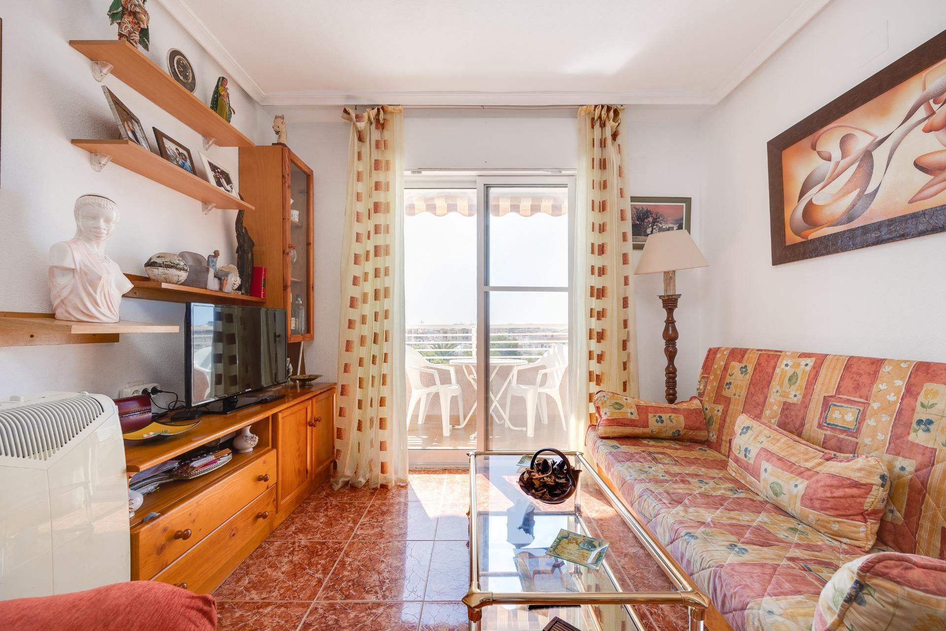 Sala d'estar de Apartament en venda en Torrevieja amb Terrassa i Piscina comunitària