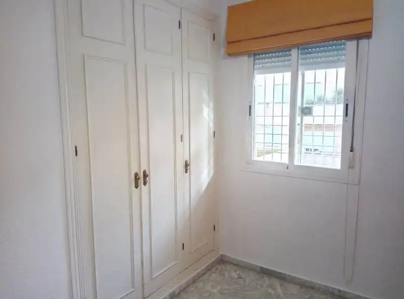 Bedroom of Flat for sale in Tomares  with Air Conditioner, Terrace and Community pool