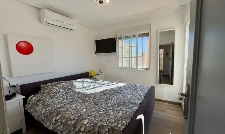 Dormitori de Casa adosada en venda en Orihuela amb Aire condicionat, Jardí privat i Terrassa