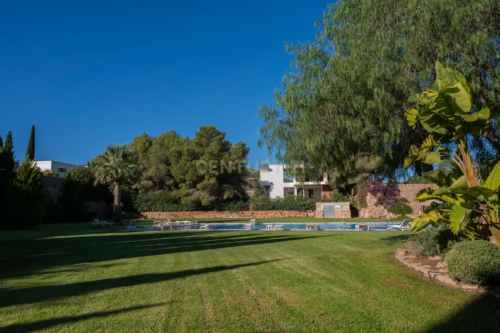 Jardín de Apartamento de alquiler en Santa Eulària des Riu con Aire acondicionado, Jardín privado y Piscina comunitaria