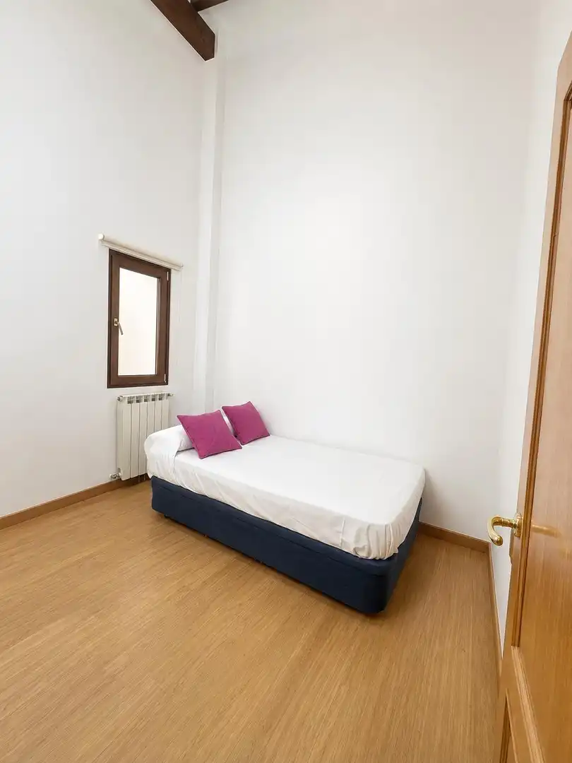 Habitación de Casa adosada en venta en Riotuerto con Calefacción y Terraza