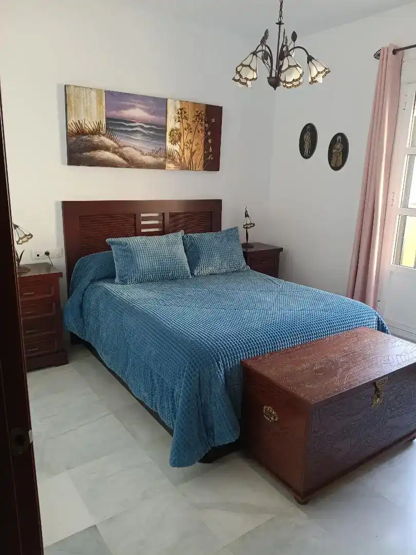 Dormitori de Casa adosada en venda en La Rinconada amb Aire condicionat i Balcó