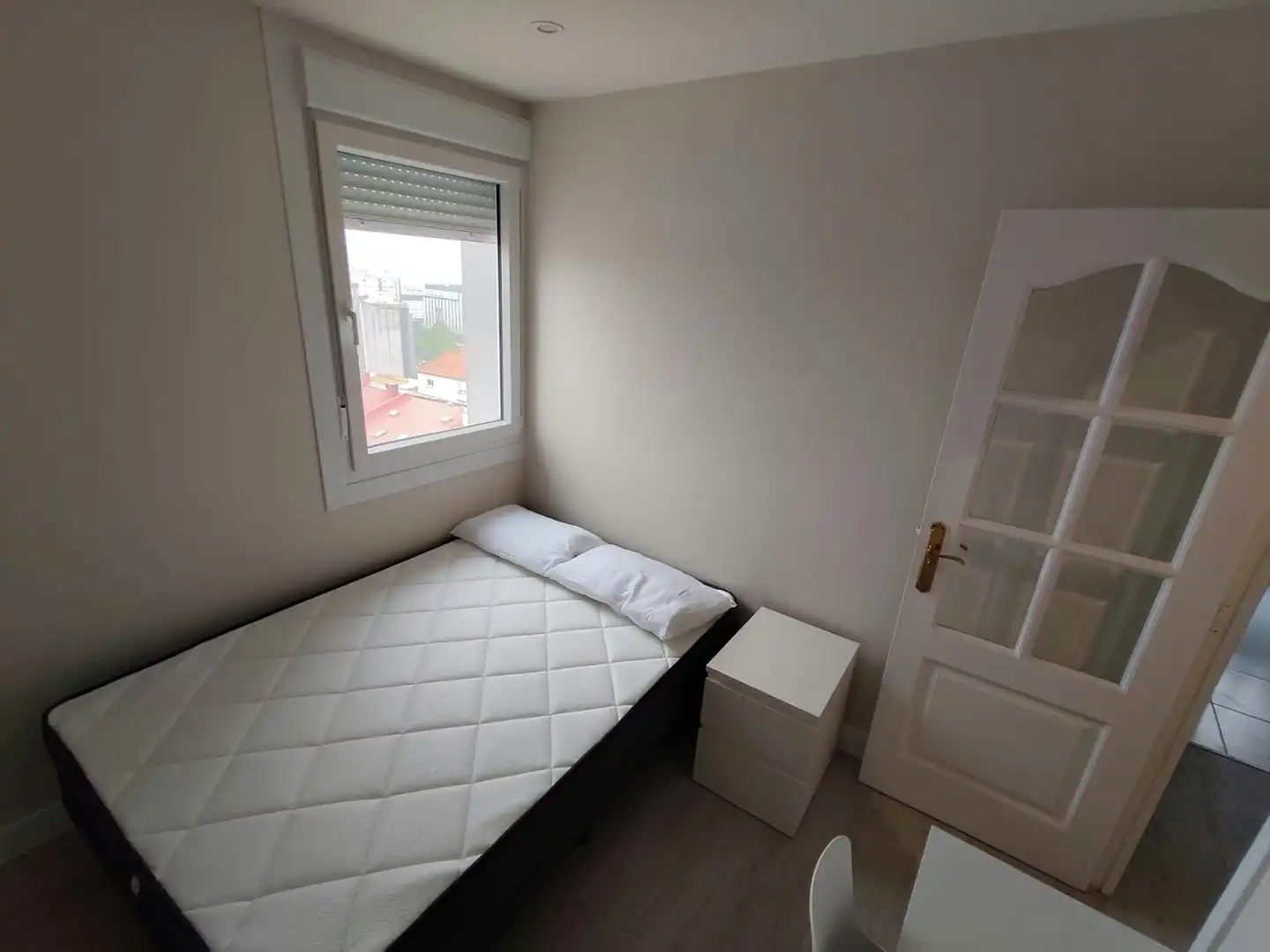 Bedroom of Flat for share in Os Mallos
