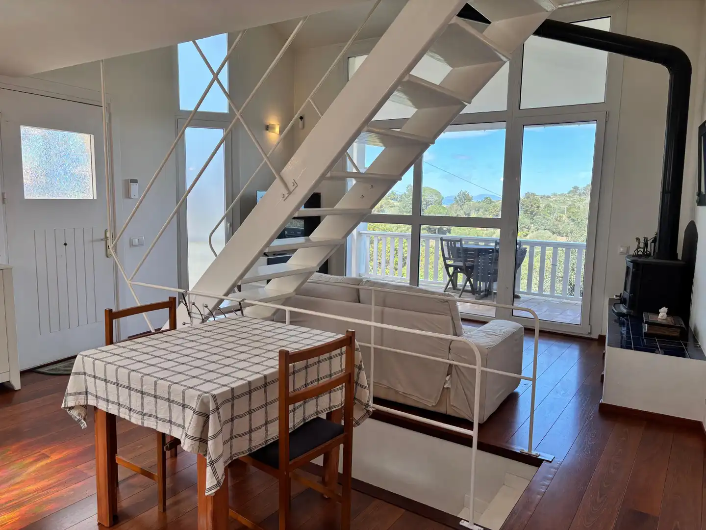 Sala de estar de Casa adosada en venta en Begur con Aire acondicionado, Calefacción y Jardín privado