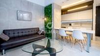 Living room of Flat for sale in  Sevilla Capital  with Terrace, Swimming Pool and Furnished