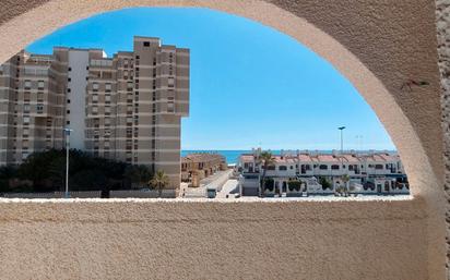 Exterior view of Duplex for sale in La Manga del Mar Menor  with Terrace