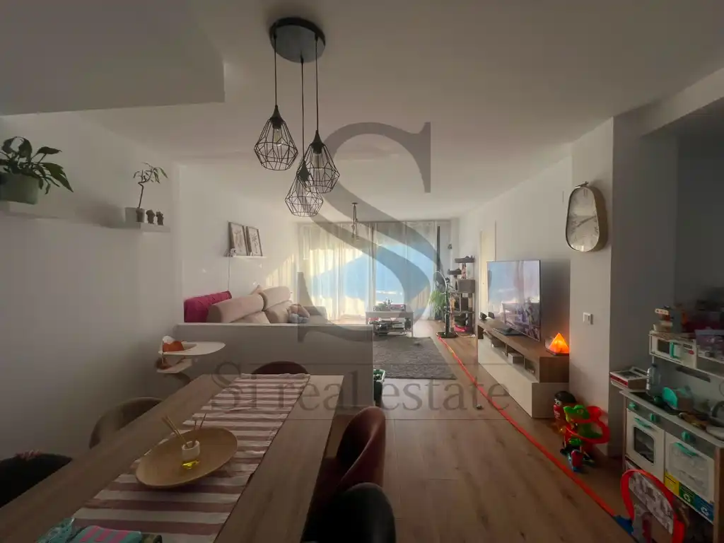 Sala de estar de Casa adosada en venta en Calafell con Calefacción, Jardín privado y Parquet