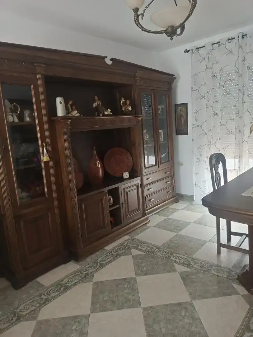 Sala d'estar de Casa adosada en venda en Fuente Vaqueros amb Aire condicionat i Balcó