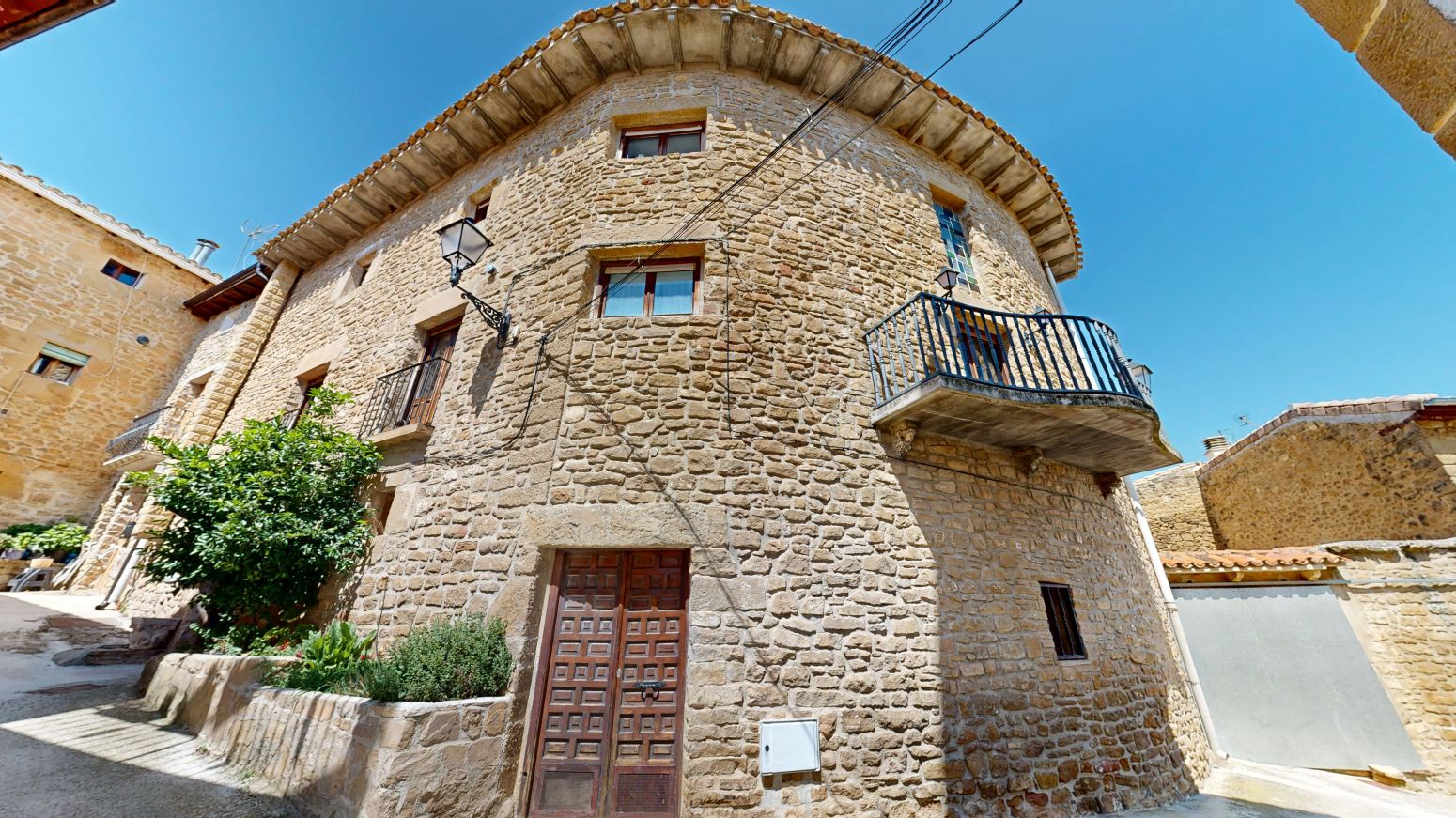 Vista exterior de Casa adosada en venda en Pueyo amb Calefacció, Parquet i Terrassa