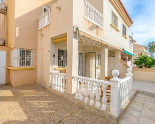 Exterior view of Single-family semi-detached for sale in Torrevieja  with Air Conditioner, Private garden and Terrace