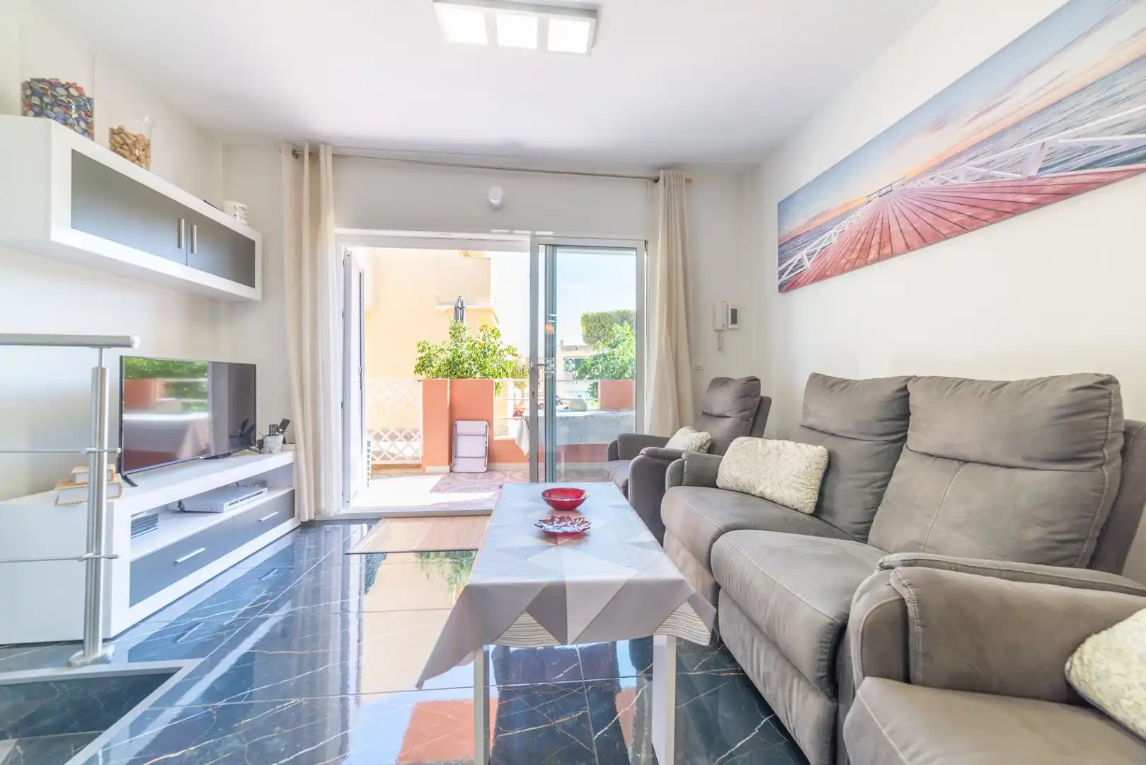 Sala d'estar de Casa adosada en venda en San Javier amb Aire condicionat, Jardí privat i Terrassa