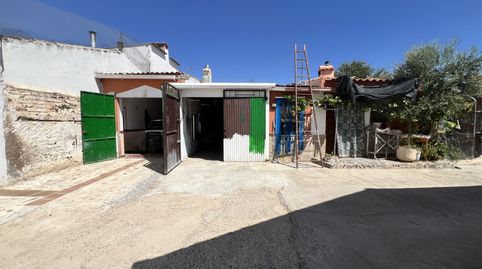 Venta de parcela con 2 cocheras y cocina campera