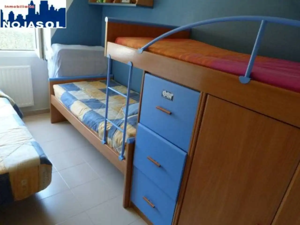 Dormitori de Apartament de lloguer en Arnuero amb Calefacció, Jardí privat i Terrassa