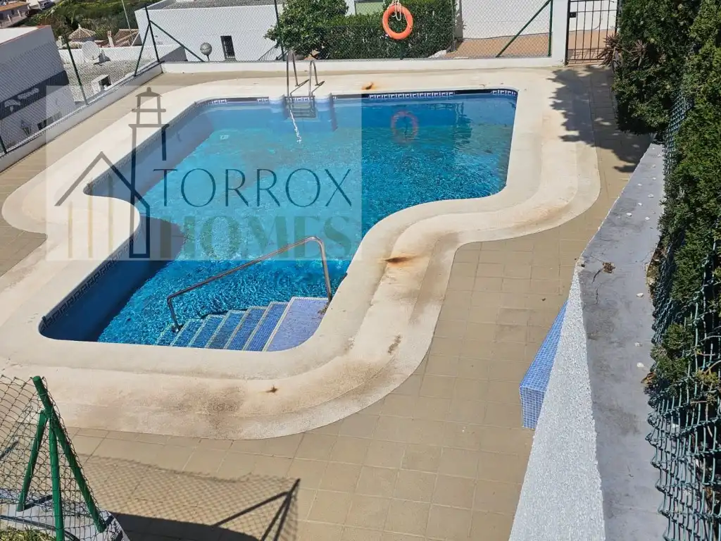 Swimming pool of Apartments for sale in Torrox