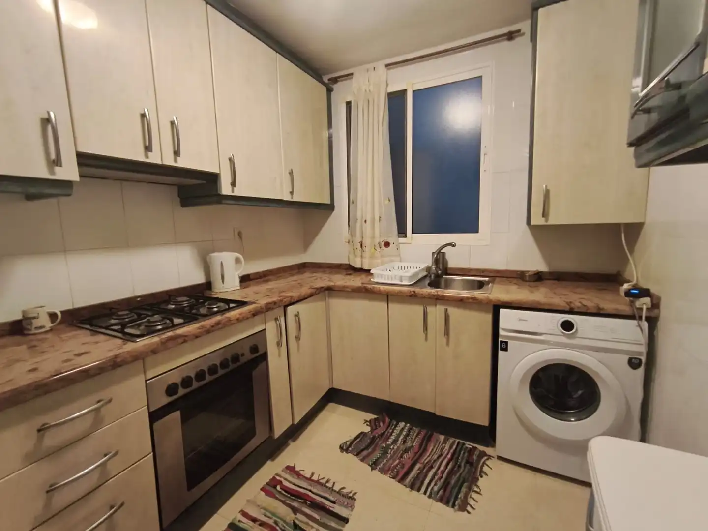 Küche von Wohnung zum Verkauf in Burjassot mit Parkett, Ofen und Waschmaschine