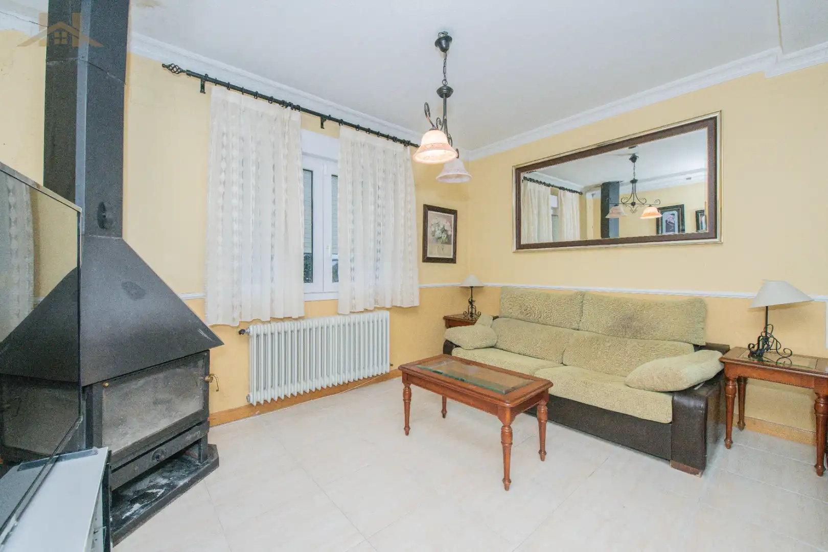 Sala d'estar de Casa adosada en venda en Villaviciosa de Odón amb Calefacció, Jardí privat i Terrassa