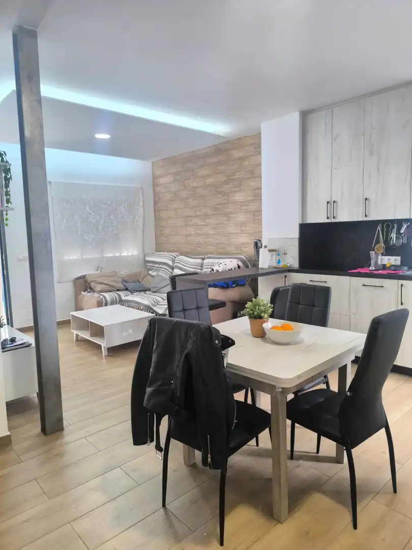 Sala de estar de Casa adosada en venta en Málaga con Aire acondicionado, Calefacción y Terraza